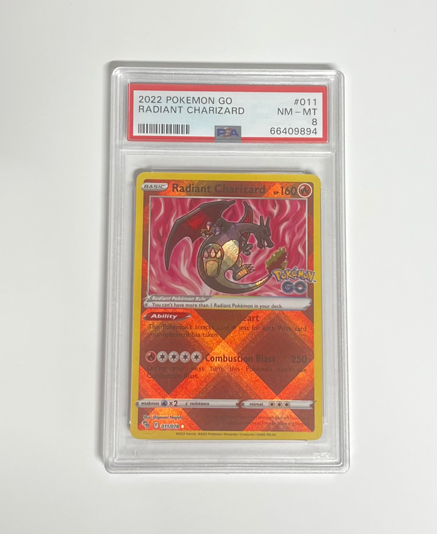 RADIANT CHARIZARD 2022 POKEMON GO PSA NM-MT 8